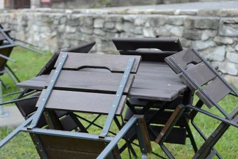 Empty table and chairs lean on table Stock Photos