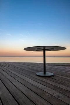 Empty table at the beach. Stock Photos
