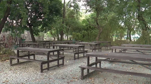 Empty table-bench on peaceful park Stock Footage 34304403