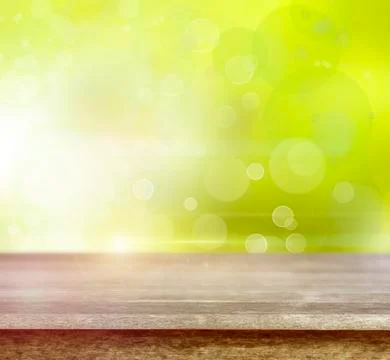 Empty table in front of abstract green background イラスト素材