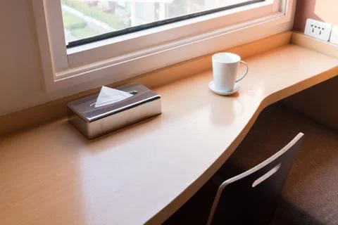 Empty table in front of blur coffee shop. Stock Photos