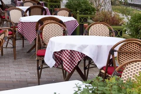 An empty table of an outdoor cafe Stock Photos