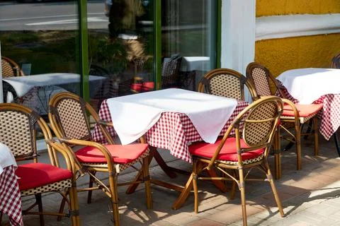 An empty table of an outdoor cafe Stock Photos