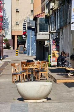 An empty table of an outdoor cafe Stock Photos