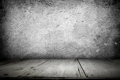 Empty table for present product on grey concrete wall. Stock Photos