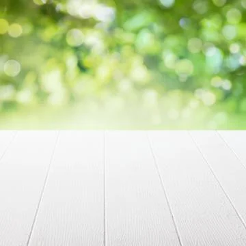 Empty table in a summer garden Stock Photos