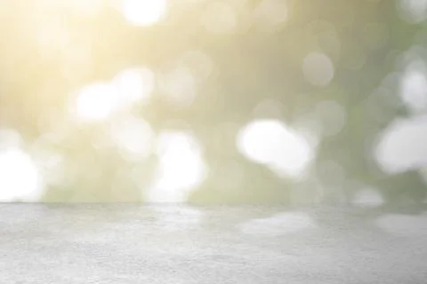 Empty table top with abstract bokeh lights of blur green background Stock Illustration