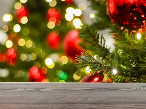 The empty table wooden board in front of the background is blurred. Stock Photos