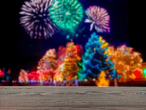 The empty table wooden board in front of the background is blurred. Stock Photos