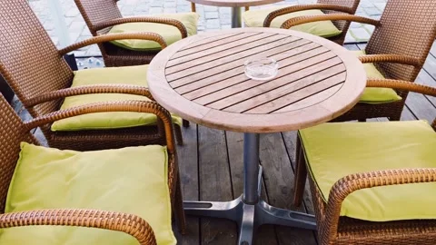 Empty tables and chairs in cafe outdoors, pandemic and hospitality industry Stock Footage 139795039