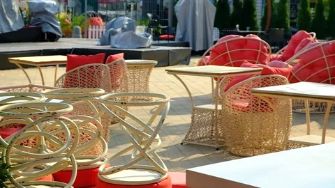 Empty tables and chairs in the restaurant. Video stock 138717694