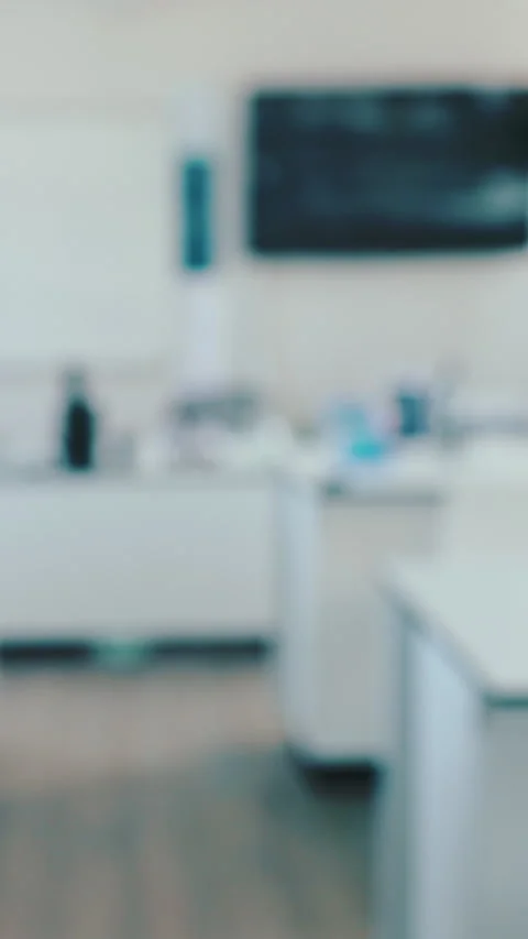 Empty, tables and science in classroom at school for research, chemistry and Stock Footage 332928212