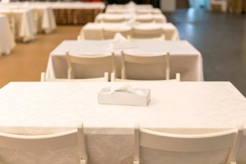 Empty tables in a cafe with beige tablecloths Stock Photos