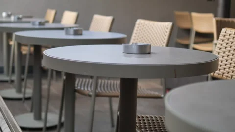 Empty tables at a cafe waiting for customers Stock Footage 340304573