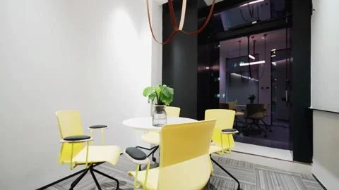 Empty tables in conference hall with no people for business meeting office Video stock 334027326