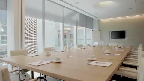 Empty tables in conference hall with no people for business meeting office 스톡 동영상 334027361