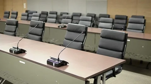 Empty tables in conference hall with no people for business meeting office 스톡 동영상 334027446