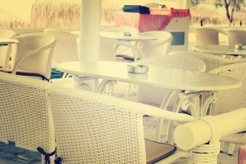 Empty tables at an outdoor restaurant Stock Photos