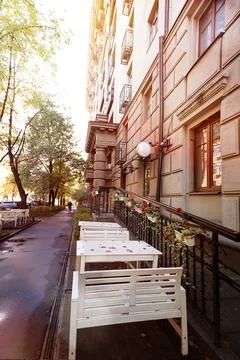 Empty tables at sidewalk cafe Stock Photos