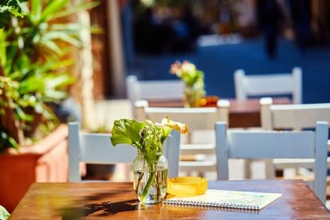 Empty tables of street cafes Stock Photos