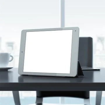 Empty tablet on office table 库存插图