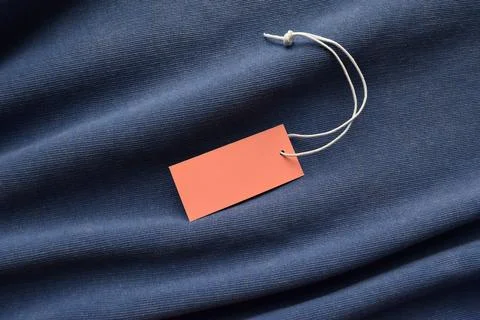 Empty tag on fabric Stock Photos