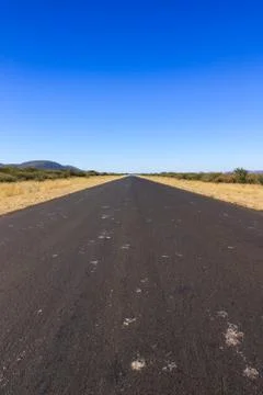 Empty tar road to nowhere namibia, africa. Stock Photos