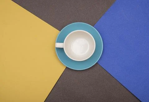 Empty tea cup top view on table with color cards Stock Photos