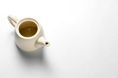 An empty tea pot isolated on white background 写真素材