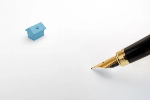 Empty template document signature pen house contract signing papers. Model ho Stock Photos