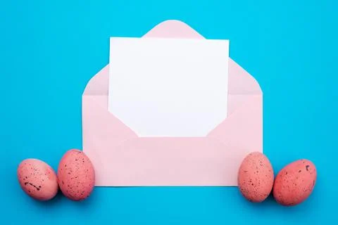 Empty template mockup white blank in the pink envelope Easter background. -.. Stock Photos