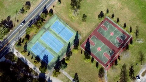 Empty Tennis Court and Basketball Court, Aerial View Stock Photos