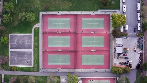Empty Tennis Courts During Coronavirus Lockdown Birds Eye View Video stock 128404465