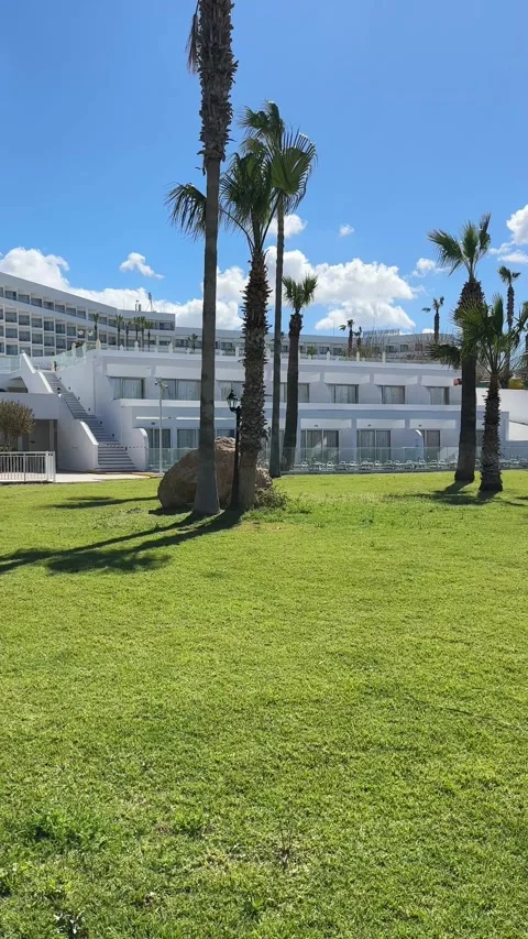 Empty territory with grass at the hotel resort, Cyprus Video stock 331868850