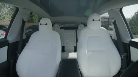 Empty Tesla Model Y car self driving usi... | Stock Video | Pond5