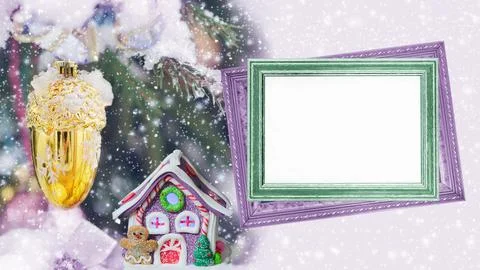 An empty text frame and a lamp in the shape of a gingerbread house on a Fotos de archivo