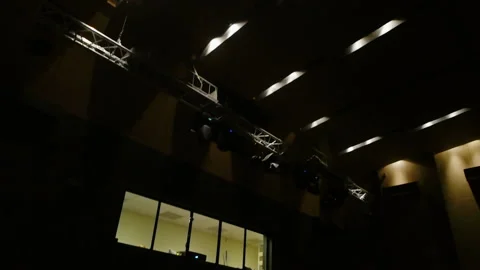 Empty theater hall with dark fabric seats. Media. Camera flight through a Stock Footage 140536014