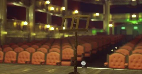Empty theater with music stand ready for performance before audience arrival Stock Illustration