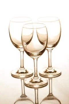 Empty three wine glasses Stock Photos