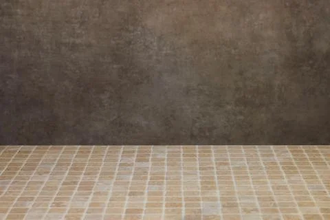 Empty Tiled Floor With Textured Brown Wall Background For Product Display Or Stu Stock Photos