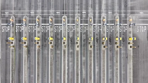 Empty toll plaza checkpoint on highway aerial view 스톡 동영상 342327480