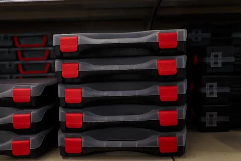 Empty tool boxes or containers for instruments on supermarket shelf. Building Fotos de archivo