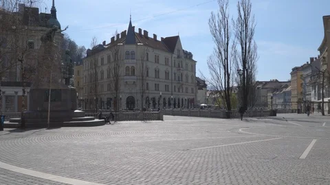 Empty town square with few people walking around. Stock Footage 126571517