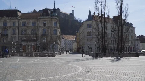 Empty town square with few people walking around. Stock Footage 126572050