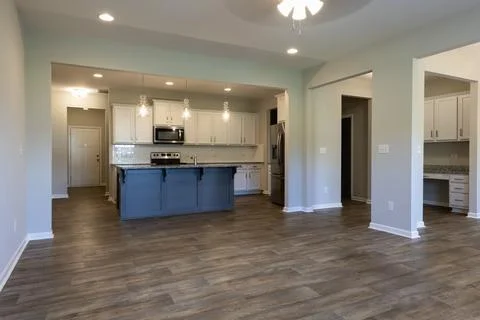 Empty Townhome Floor with Kitchen. Stock-Fotos