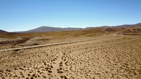 Empty trails of Arid and dry desert ALTIPLANO AERIAL mountains background Stock Footage 88418352