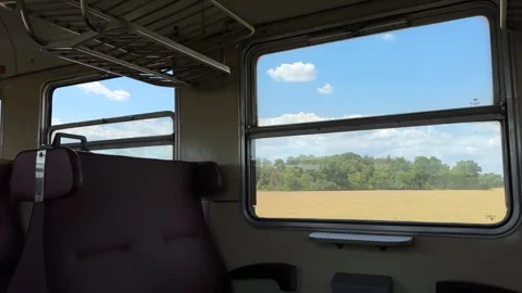 Empty Train Car Interior with Serene Ambiance Stock Footage 285038930