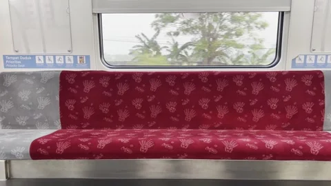 Empty Train Seat Inside Moving Commuter Train with Window View Stock Footage 339326811