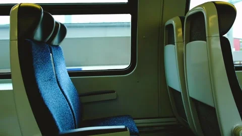 Empty train sits in moving train Video stock 138454409
