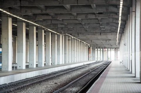 Empty train station from with massive concrete columns Stock Photos
